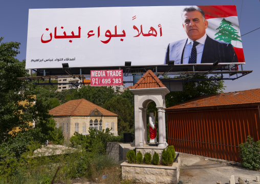 Political propaganda billboard near a Virgin Maria statue, Beqaa Governorate, Zahle, Lebanon