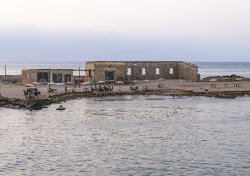 People relaxing on the seafront, North Governorate, Tripoli, Lebanon
