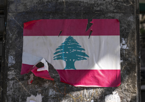 Lebanon flag poster teared on a wall, Beirut Governorate, Beirut, Lebanon
