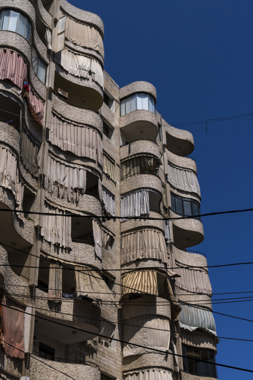 Building with old and dirty curtains to protect from the sun, Beirut Governorate, Beirut, Lebanon