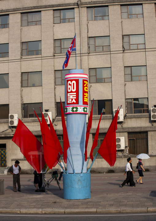 Set of North Korean flags in front of a building, DGC, Pyongyang, North Korea
