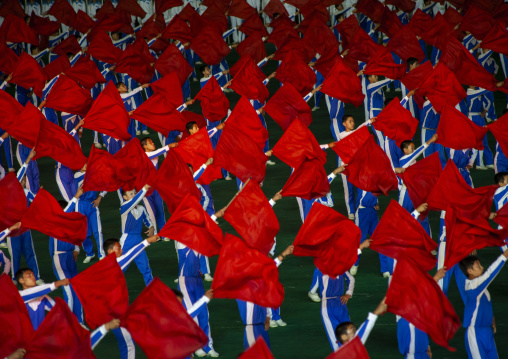 North Korean gymnasts with red flags during the Arirang mass games, DGC, Pyongyang, North Korea