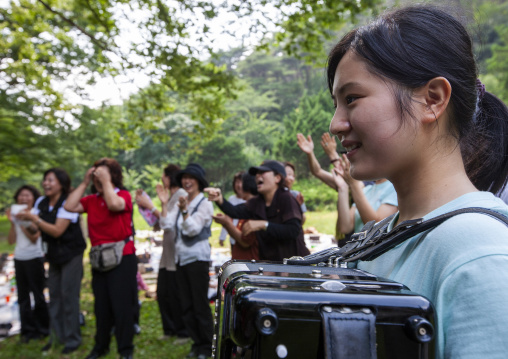 Japanese people originated from North Korea having fun in a park, North Hwanghae, Sariwon, North Korea