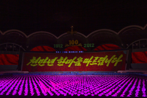 Children holding up boards during Arirang, DGC, Pyongyang, North Korea