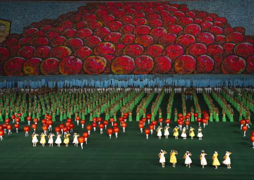 Children holding up boards during Arirang to make apples, DGC, Pyongyang, North Korea