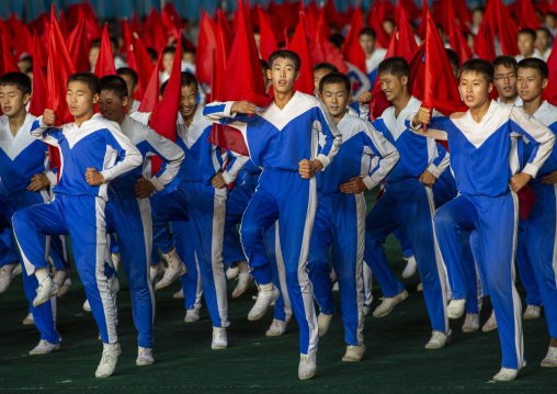 North Korean gymnasts with red flags during the Arirang mass games, DGC, Pyongyang, North Korea