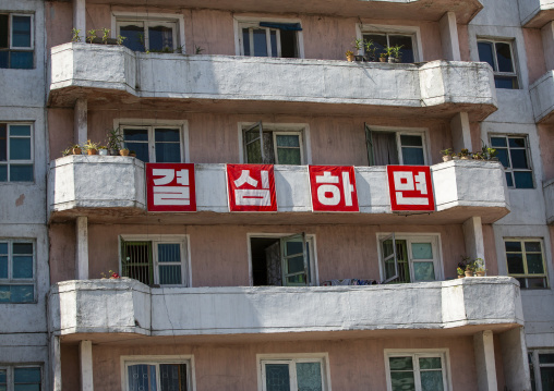 Propaganda slogan on an apartements in the city center, Kangwon Province, Wonsan, North Korea