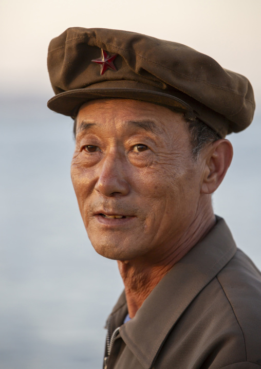 Portrait of a North Korean man with a cap, Kangwon Province, Wonsan, North Korea