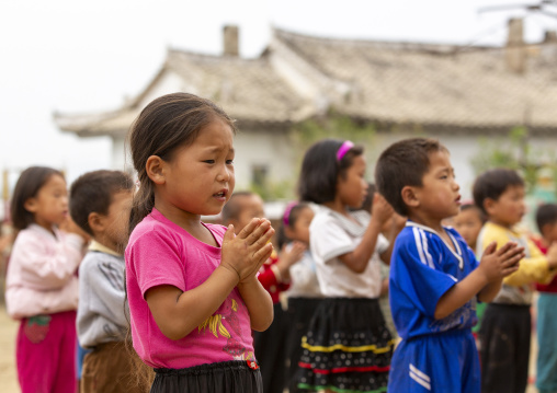 North Korean children making morning gymnastics at school, South Hamgyong, Hamhung, North Korea