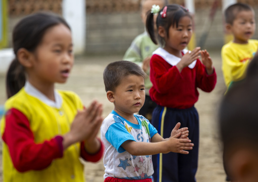 North Korean children making morning gymnastics at school, South Hamgyong, Hamhung, North Korea