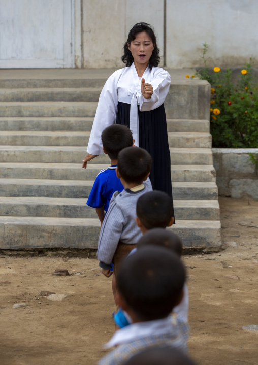 North Korean children making morning gymnastics at school, South Hamgyong, Hamhung, North Korea