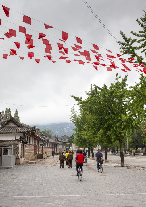 Road decorated with flags, North Hwanghae, Kaesong, North Korea