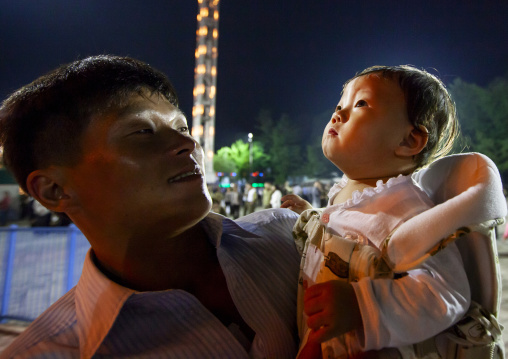 North Korean father and daughter at night, DGC, Pyongyang, North Korea
