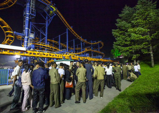 North Korean people queueing for the roller coaster in Kaeson youth park, DGC, Pyongyang, North Korea