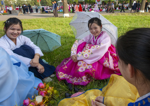 North Korean women in choson-ot resting in a park, DGC, Pyongyang, North Korea