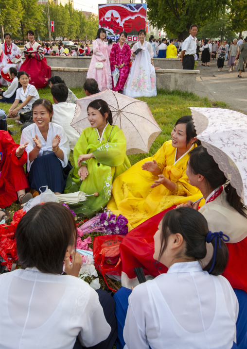 North Korean women in choson-ot resting in a park, DGC, Pyongyang, North Korea