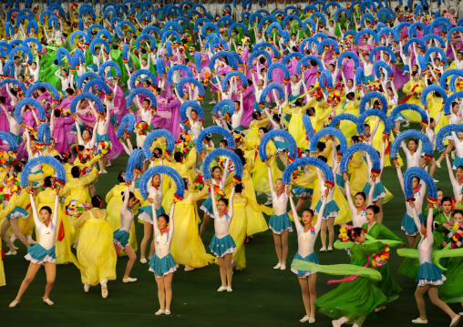 Women dancing in choson-ot during the Arirang mass games, DGC, Pyongyang, North Korea