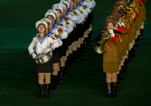 North Korean women dressed as sailors and soldiers during the Arirang, DGC, Pyongyang, North Korea