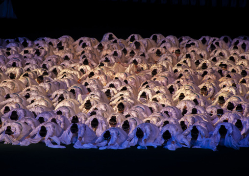Women dancing in choson-ot during the Arirang mass games, DGC, Pyongyang, North Korea