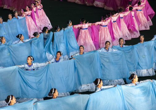 Women dancing in choson-ot during the Arirang mass games, DGC, Pyongyang, North Korea