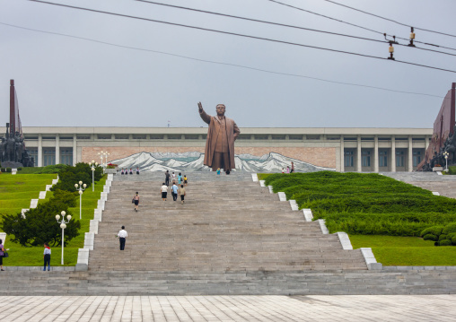 People climbing the stairs leading to the statue of Kim il Sung in Mansudae, DGC, Pyongyang, North Korea