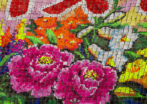 Children holding up boards during Arirang to create flowers, DGC, Pyongyang, North Korea