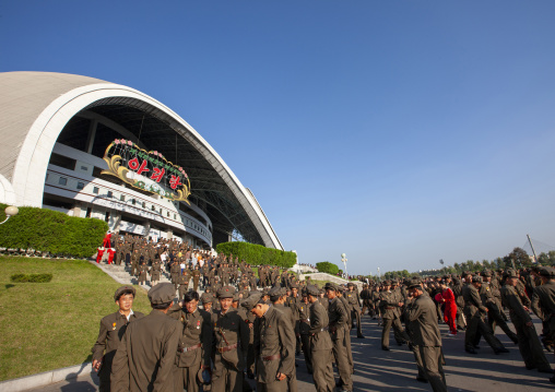 Soldiers coming out of the may day stadium after the Arirang mass games, DGC, Pyongyang, North Korea