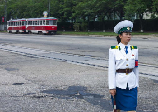 North Korean traffic security officer in white uniform in the street, DGC, Pyongyang, North Korea