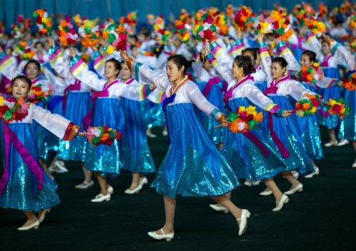 Women dancing in choson-ot during the Arirang mass games, DGC, Pyongyang, North Korea