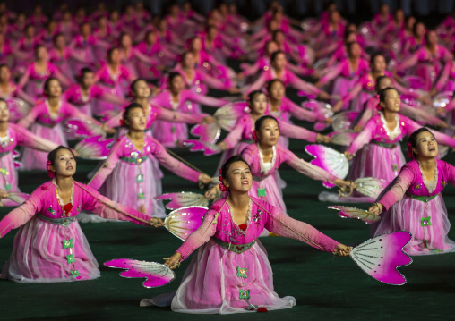 Women dancing in choson-ot during the Arirang mass games, DGC, Pyongyang, North Korea