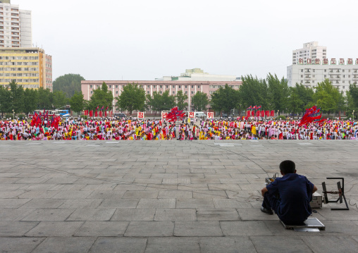 Students dancing on day of the foundation of the republic, DGC, Pyongyang, North Korea