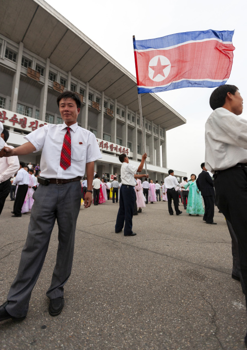 Students dancing on day of the foundation of the republic, DGC, Pyongyang, North Korea