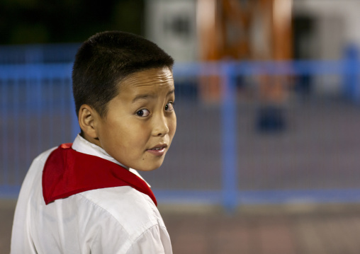 North Korean pioneer boy in the street, DGC, Pyongyang, North Korea