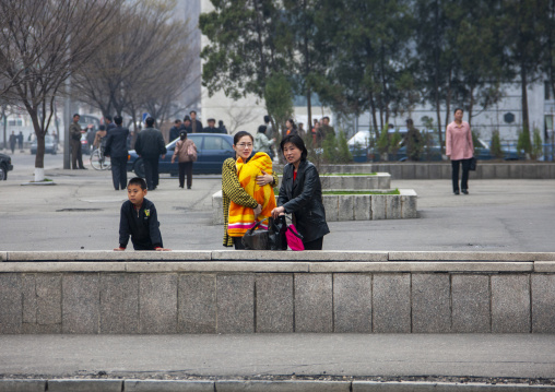 North Korean women with children in the street, DGC, Pyongyang, North Korea