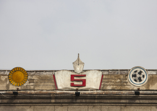 School logos on a building, DGC, Pyongyang, North Korea