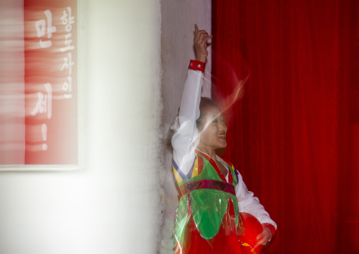 North Korean girl during a show for toursist in a school, DGC, Pyongyang, North Korea