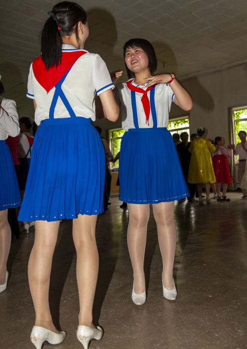 North Korean pioneer girls dancing in a school, DGC, Pyongyang, North Korea
