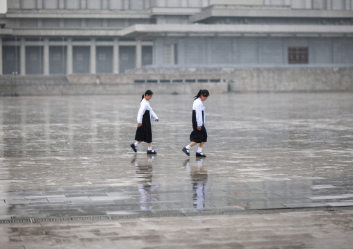 Girls under the rain in Kumsusan palace of the sun mausoleum for the leaders DGC, Pyongyang, North Korea