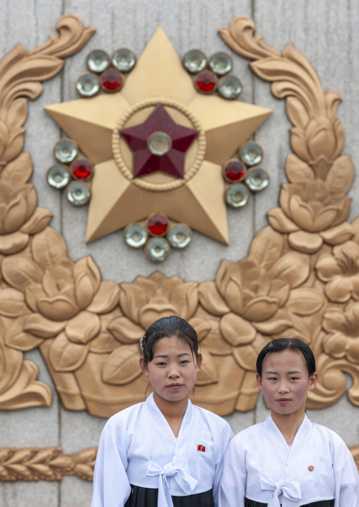 North Korean women under the rain in Kumsusan memorial palace, DGC, Pyongyang, North Korea