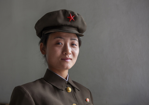 Portrait of a North Korean woman soldier with a cap, DGC, Pyongyang, North Korea