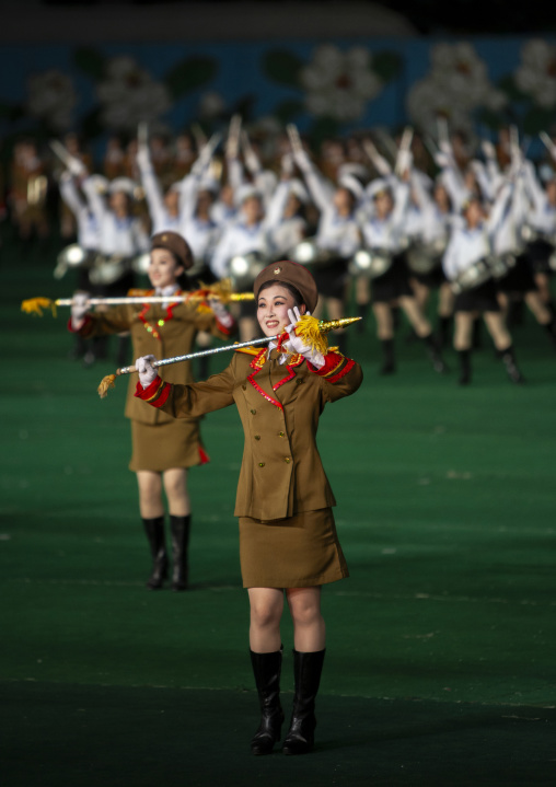 Women dressed as soldiers dancing with swords during Arirang, DGC, Pyongyang, North Korea