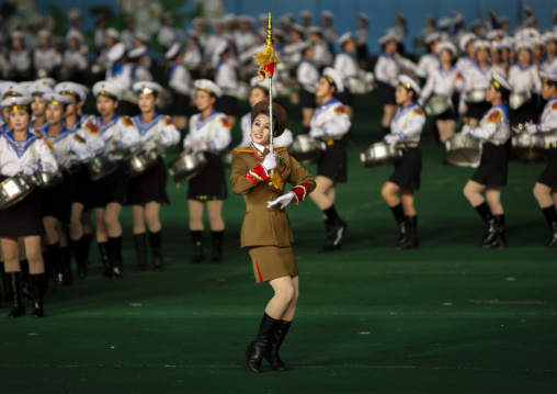 Women dressed as soldiers dancing with swords during Arirang, DGC, Pyongyang, North Korea