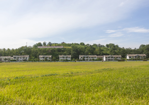 Propaganda billboards in a village, South Pyongan, Chongsan-ri Cooperative Farm, North Korea