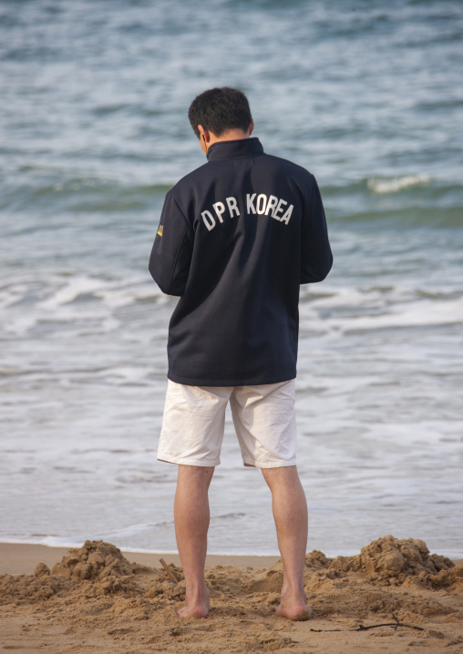 North Korean judo team coach on a beach, North Hamgyong, Chilbo Sea, North Korea
