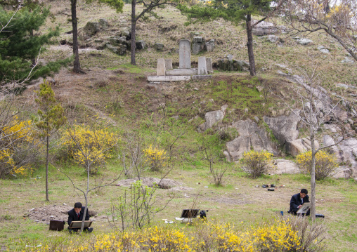 North Korean art students painting in a park, North Hwanghae, Kaesong, North Korea