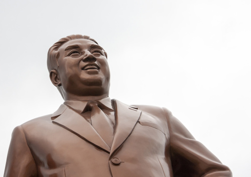 Propaganda monument with smiling Kim il Sung statue, South Pyongan, Chongsan-ri Cooperative Farm, North Korea