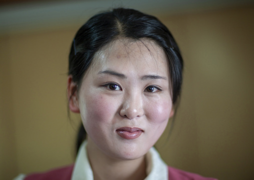 Portrait of a North Korean waitress in a restaurant, DGC, Pyongyang, North Korea