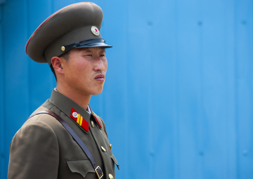 North Korean soldier standing on the demarcation line in the DMZ, North Hwanghae, Panmunjom, North Korea