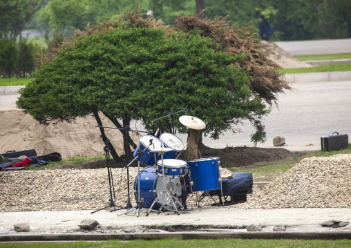 Drums to entertain workers on a construction site, DGC, Pyongyang, North Korea