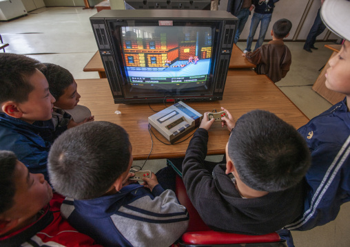 Children playing video games in Songdowon international children's camp, Kangwon Province, Wonsan, North Korea